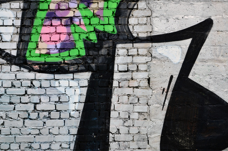 Background image of the wall decorated with colorful abstract graffiti. Street art conceptの写真素材