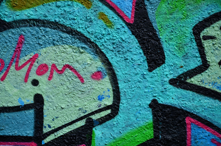 Street art. Colorful graffiti on the wall. Fragment for background. Abstract detail of a graffitiの写真素材