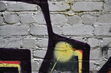 Background image of the wall decorated with colorful abstract graffiti. Street art conceptの写真素材
