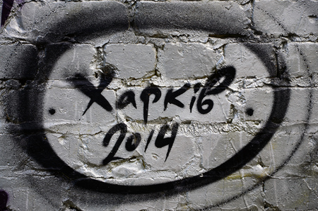Background image of the wall decorated with colorful abstract graffiti. Street art conceptの写真素材