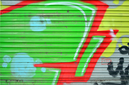 Beautiful street art graffiti. Abstract color creative drawing fashion colors on the walls of the city. Urban Contemporary Culture. Title paint on walls. Culture youth protestの写真素材