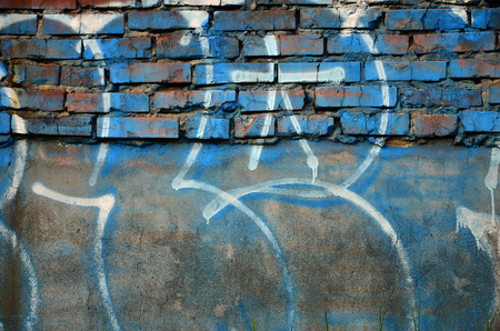Art under ground. Beautiful street art graffiti style. The wall is decorated with abstract drawings house paint. Modern iconic urban culture of street youth. Abstract stylish picture on wallの写真素材