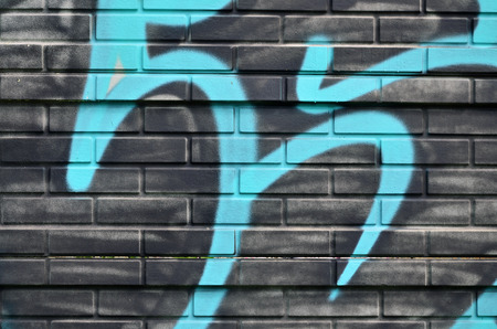 Street art. Colorful graffiti on the wall. Fragment for background. Abstract detail of a graffitiの写真素材