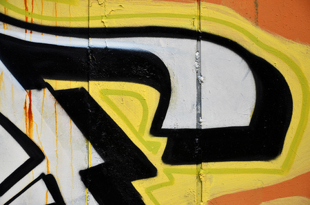 Street art. Colorful graffiti on the wall. Fragment for background. Abstract detail of a graffitiの写真素材