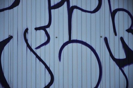 Art under ground. Beautiful street art graffiti style. The wall is decorated with abstract drawings house paint. Modern iconic urban culture of street youth. Abstract stylish picture on wallの写真素材
