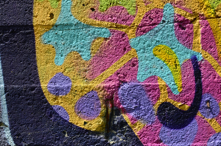 Beautiful street art graffiti. Abstract color creative drawing fashion colors on the walls of the city. Urban Contemporary Culture. Title paint on walls. Culture youth protestの写真素材