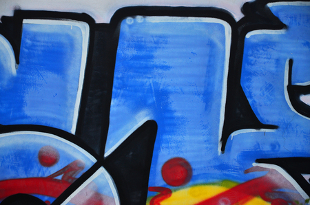 Art under ground. Beautiful street art graffiti style. The wall is decorated with abstract drawings house paint. Modern iconic urban culture of street youth. Abstract stylish picture on wallの写真素材