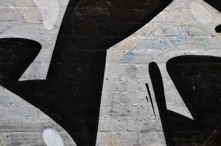 Background image of the wall decorated with colorful abstract graffiti. Street art conceptの写真素材