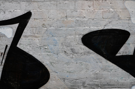 Street art. Colorful graffiti on the wall. Fragment for background. Abstract detail of a graffitiの写真素材