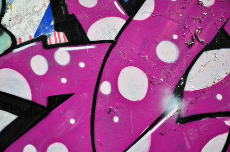 Background image of the wall decorated with colorful abstract graffiti. Street art conceptの写真素材