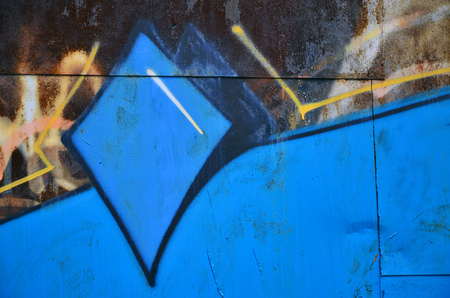 Background image of the wall decorated with colorful abstract graffiti. Street art conceptの写真素材