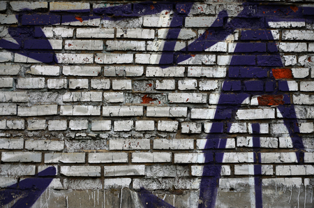 Art under ground. Beautiful street art graffiti style. The wall is decorated with abstract drawings house paint. Modern iconic urban culture of street youth. Abstract stylish picture on wallの写真素材