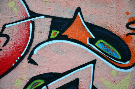 Street art. Colorful graffiti on the wall. Fragment for background. Abstract detail of a graffitiの写真素材