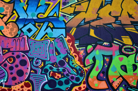 Beautiful street art graffiti. Abstract color creative drawing fashion colors on the walls of the city. Urban Contemporary Culture. Title paint on walls. Culture youth protestの写真素材