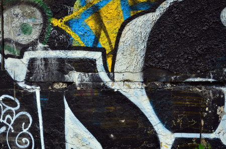 Art under ground. Beautiful street art graffiti style. The wall is decorated with abstract drawings house paint. Modern iconic urban culture of street youth. Abstract stylish picture on wallの写真素材