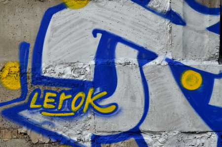 Art under ground. Beautiful street art graffiti style. The wall is decorated with abstract drawings house paint. Modern iconic urban culture of street youth. Abstract stylish picture on wallの写真素材