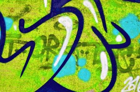 Art under ground. Beautiful street art graffiti style. The wall is decorated with abstract drawings house paint. Modern iconic urban culture of street youth. Abstract stylish picture on wallの写真素材