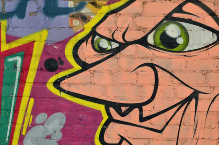 Beautiful street art graffiti. Abstract color creative drawing fashion colors on the walls of the city. Urban Contemporary Culture. Title paint on walls. Culture youth protestの写真素材