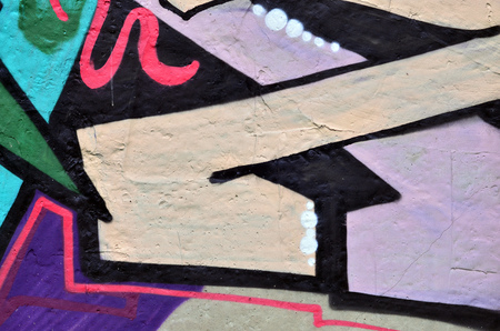 Art under ground. Beautiful street art graffiti style. The wall is decorated with abstract drawings house paint. Modern iconic urban culture of street youth. Abstract stylish picture on wallの写真素材