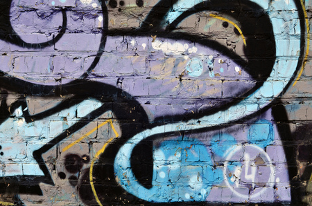 Art under ground. Beautiful street art graffiti style. The wall is decorated with abstract drawings house paint. Modern iconic urban culture of street youth. Abstract stylish picture on wallの写真素材