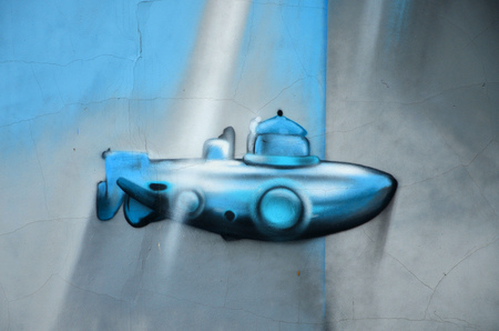 Detailed image of color graffiti drawing. Background Street art background with a painted underwater bathyscaphe or submarineの写真素材