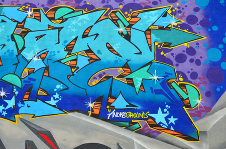 Detailed image of color graffiti drawing. Background street art picture. Part of the colorful masterpiece by the professional graffiti artistの写真素材