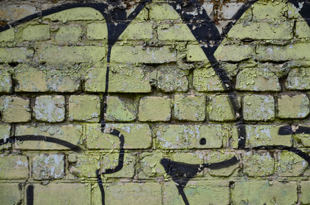 Detailed image of very old and aged color graffiti drawing on the wall. Background grunge street art pictureの写真素材