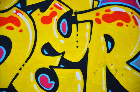 Detailed image of color graffiti drawing. Background street art picture. Part of the colorful masterpiece by the professional graffiti artistの写真素材