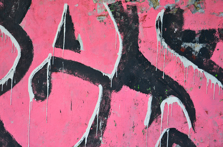 Detailed image of very old and aged color graffiti drawing on the wall. Background grunge street art pictureの写真素材
