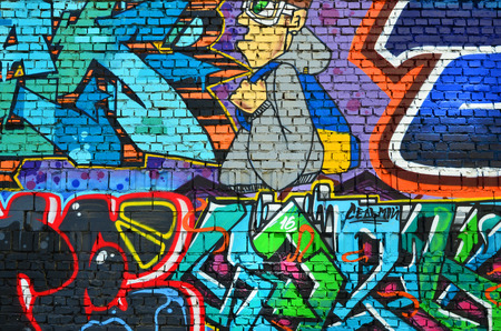 Detailed image of color graffiti drawing. Background Street art background with a painted character. Part of the colorful masterpiece by the professional graffiti artistsの写真素材