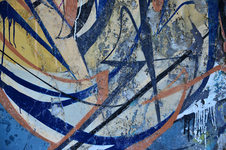 Detailed image of very old and aged color graffiti drawing on the wall. Background grunge street art pictureの写真素材