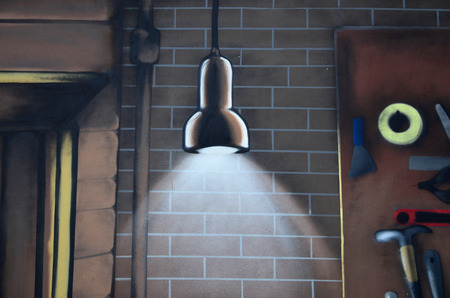 Detailed image of color graffiti drawing. Background Street art background with a painted hanging lamp in the garageの写真素材