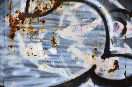 Detailed image of very old and aged color graffiti drawing on the wall. Background grunge street art pictureの写真素材