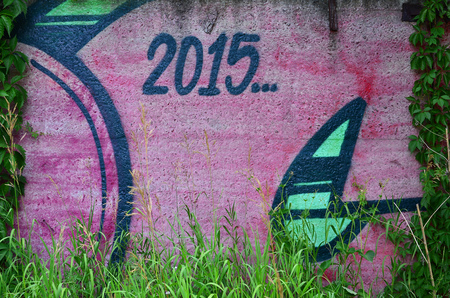 Texture of a fragment of the wall with graffiti painting, which is depicted on it. An image of a piece of graffiti drawing as a photo on street art and graffiti culture topicsの写真素材