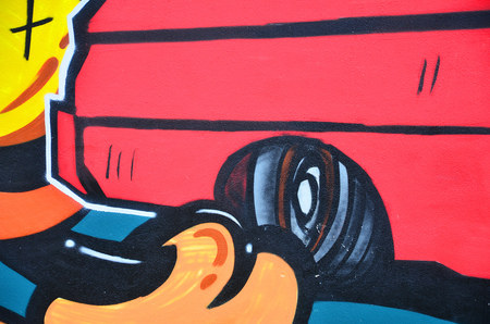 A detailed image of the graffiti drawing. A conceptual street art background with a red lowrider carの写真素材