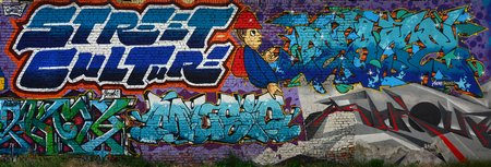 A detailed image of the graffiti drawing. A conceptual street art background with a colorful letter graffiti with word "Street culture", "Brake" and "Music"の写真素材