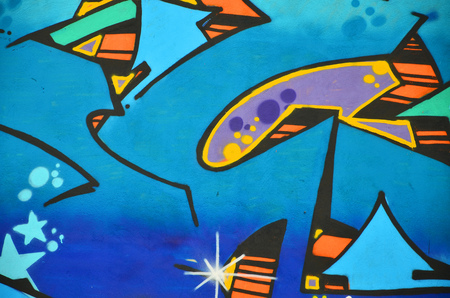 Detailed image of color graffiti drawing. Background street art picture. Part of the colorful masterpiece by the professional graffiti artistの写真素材
