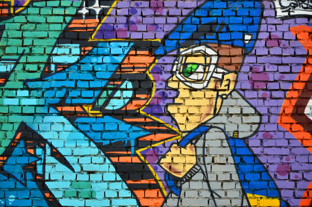 Detailed image of color graffiti drawing. Background Street art background with a painted character. Part of the colorful masterpiece by the professional graffiti artistsの写真素材