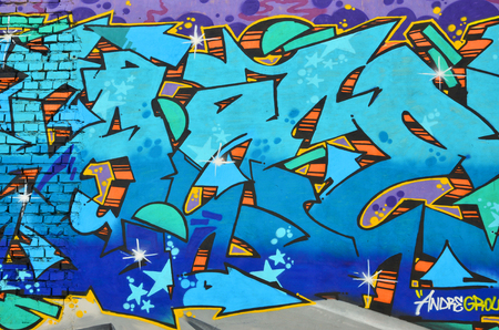 Detailed image of color graffiti drawing. Background street art picture. Part of the colorful masterpiece by the professional graffiti artistの写真素材