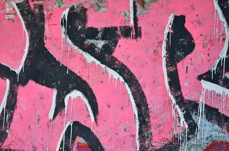 Detailed image of very old and aged color graffiti drawing on the wall. Background grunge street art pictureの写真素材