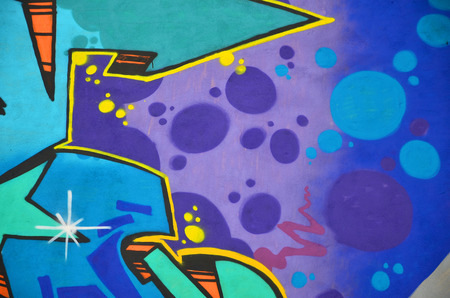 Detailed image of color graffiti drawing. Background street art picture. Part of the colorful masterpiece by the professional graffiti artistの写真素材