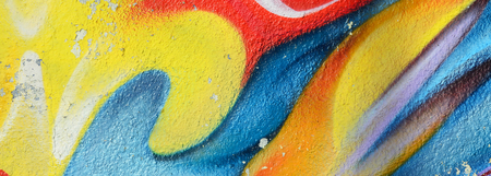 Abstract graffiti paintings on the concrete wall. Background textureの写真素材