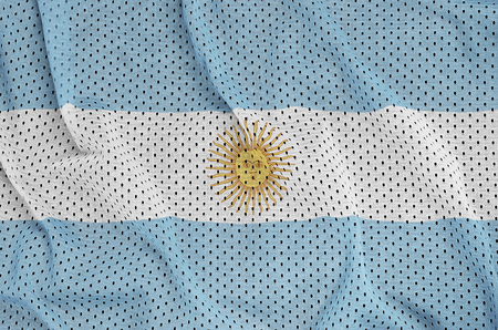 Argentina flag printed on a polyester nylon sportswear mesh fabric with some foldsの写真素材