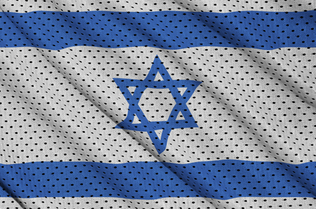 Israel flag printed on a polyester nylon sportswear mesh fabric with some foldsの写真素材