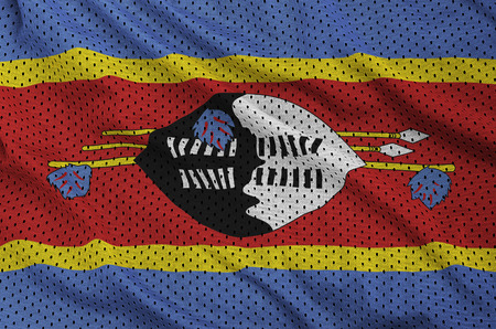 Swaziland flag printed on a polyester nylon sportswear mesh fabric with some foldsの写真素材