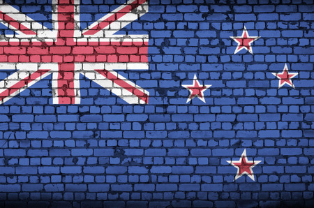 New Zealand flag is painted onto an old brick wallの写真素材