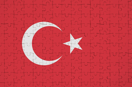 Turkey flag  is depicted on a folded puzzleの写真素材