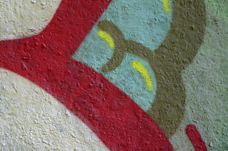 Street art. Abstract background image of a fragment of a colored graffiti painting in chrome and red tones.の写真素材