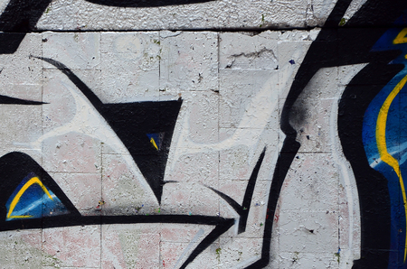 Street art. Abstract background image of a fragment of a colored graffiti painting in chrome and blue tones.の写真素材