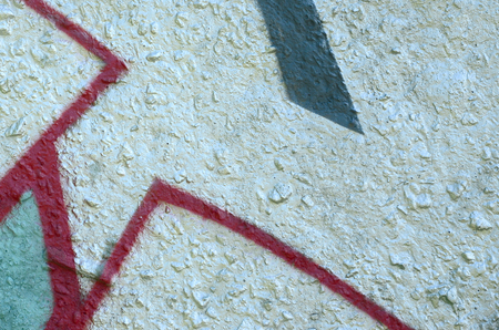 Street art. Abstract background image of a fragment of a colored graffiti painting in chrome and red tones.の写真素材
